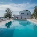 Near to Sperlonga with distant views of the sea and Mount Vesuvius is this modern architect designed villa with pool. Eco home with 3 bedrooms, gardens and olive trees.