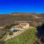 Aerial view of large Tuscan villa for sale