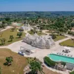 View of Trulli and pool and surroundings Puglia Italy