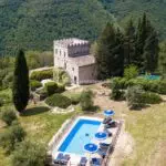 View of Florence Tuscany watchtower, pool and surrounding countryside