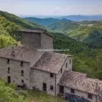 View of Umbrian hamlet for sale and views over the valley below