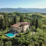 View of Tuscan villa and pool for sale