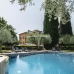 View of pool and villa hotel for sale in Umbria